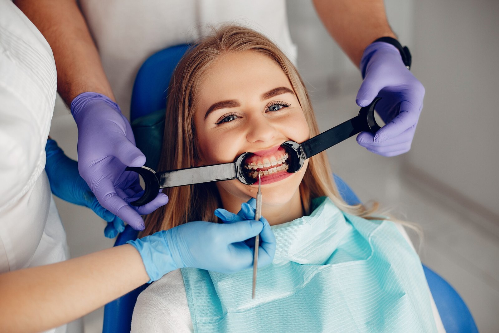 Beautiful lady in the dentist's office. Woman in a uniform